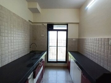 Kitchen in 1.5 BHK Apartment at Squarefeet Imperial Square, Ghodbunder Road – for Sale