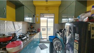 Kitchen in 1 BHK Apartment at Metropolis Aquaris Phase 1, Kasarvadavali – for Sale