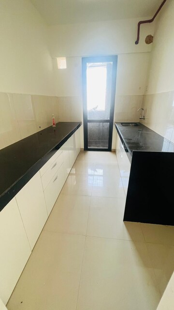 Kitchen in 1 BHK Apartment at Shapoorji Pallonji Joyville, Virar West – for Rent