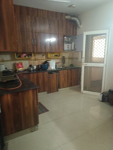 Kitchen in 2 BHK Apartment at Amrapali Silicon City, Sector 76 – for Rent