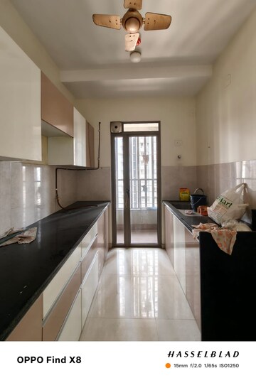 Kitchen in 2 BHK Apartment at Kalpataru Paramount, Kapur Bawdi – for Rent