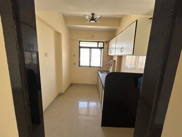 Kitchen in 2 BHK Apartment at Dheeraj Solitaire, Malad West – for Sale