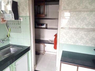 Kitchen in 2 BHK Apartment at Tata Glendale, Vasant Vihar – for Rent