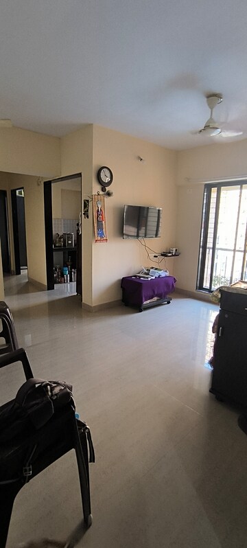 Living Room in 2 BHK Apartment at Unique Aurum, Mira Road – for Sale