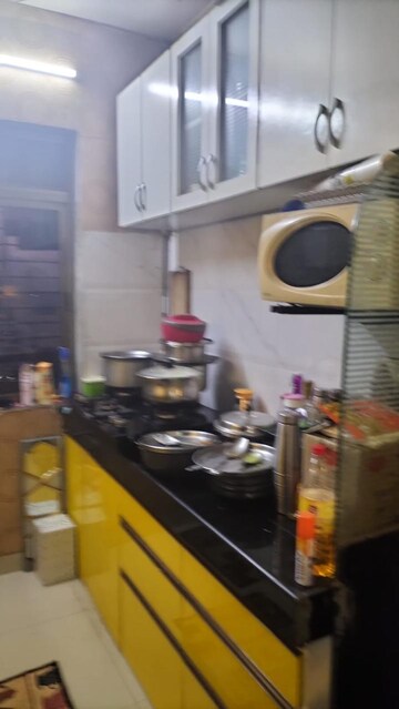 Kitchen in 2 BHK Apartment at Sagar Residency Thane, Kasarvadavali – for Rent