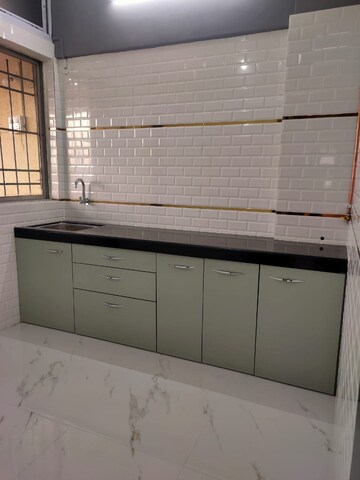 Kitchen in 1 BHK Apartment at Bhairaav Goldcrest Residency, Ghansoli – for Sale