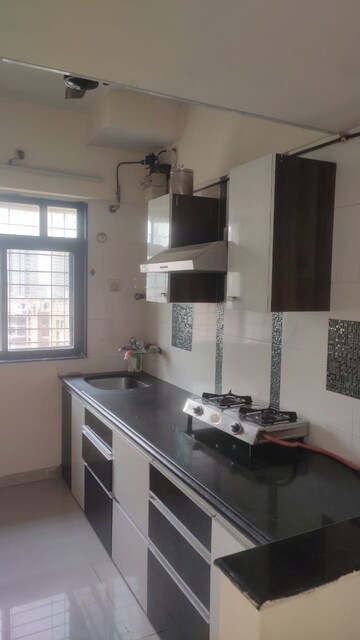 Kitchen in 2 BHK Apartment at Puranik City, Kasarvadavali – for Rent
