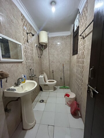 Bathroom in 2 BHK Builder Floor at Chattarpur – for Rent