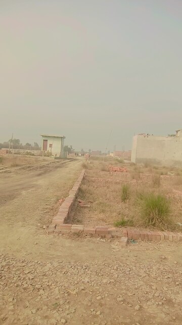 Plot Area in  Plot at Bhopani Village – for Sale