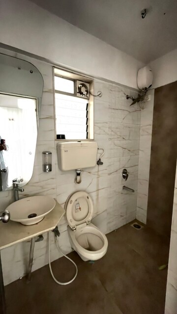 Bathroom in 2 BHK Apartment at Unique Signature Mumbai, Mira Road – for Rent