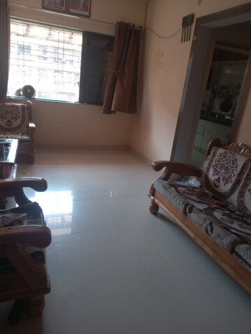 Living Room in 2 BHK Apartment at Prem Kamal Mansion, Kalyan West – for Rent