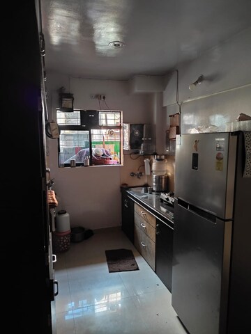 Kitchen in 2 BHK Apartment at Prem Kamal Mansion, Kalyan West – for Rent