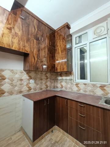 Kitchen in 2 BHK Apartment at Amrapali Golf Homes, Sector 4, Greater Noida – for Rent