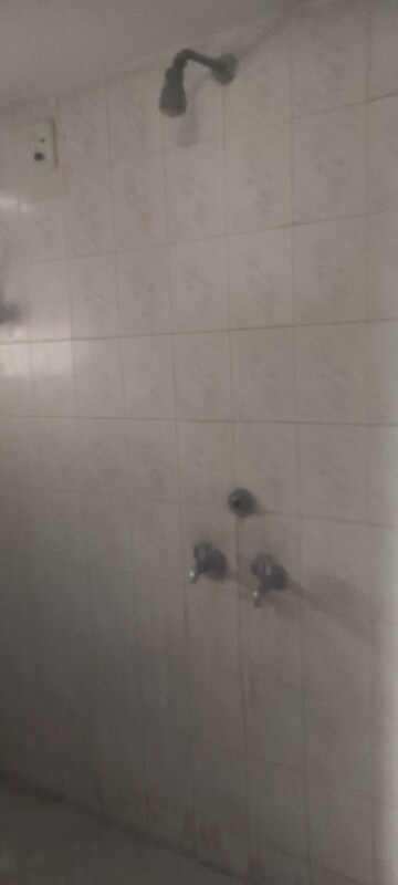 Bathroom in 1 BHK Apartment at Brahmand CHS, Brahmand – for Sale