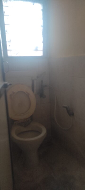 Bathroom in 1 BHK Apartment at Brahmand CHS, Brahmand – for Sale