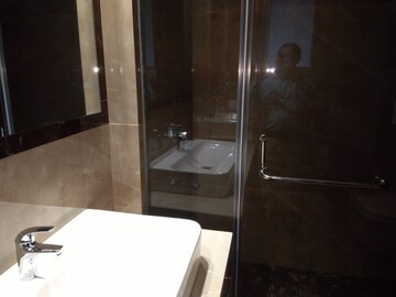 Bathroom in 4 BHK Apartment at Sarvodya Enclave – for Rent