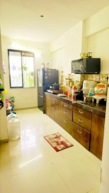 Kitchen in 1 BHK Apartment at Harihar Enclave CHS, Vasai East – for Sale