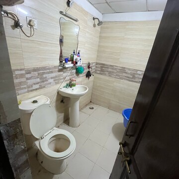 Bathroom in 3 BHK Apartment at Amrapali Zodiac, Sector 120 – for Rent