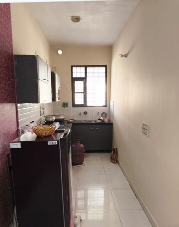 Kitchen in 3 BHK Builder Floor at Dhakoli Village – for Sale