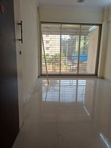 Living Room in 1 BHK Apartment at Chamunda Residency, Ghansoli – for Rent