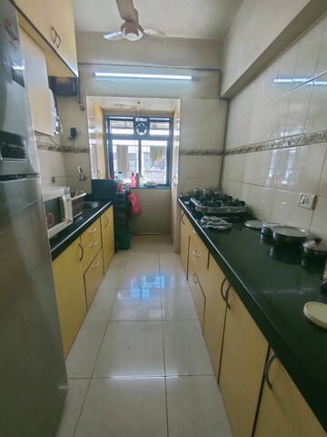 Kitchen in 2 BHK Apartment at Lokhandwala Infrastructure Spring Leaf, Kandivali East – for Rent