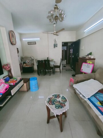 Living Room in 2 BHK Apartment at Lokhandwala Infrastructure Spring Leaf, Kandivali East – for Rent