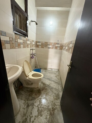Bathroom in 2 BHK Builder Floor at Freedom Fighters Enclave – for Rent