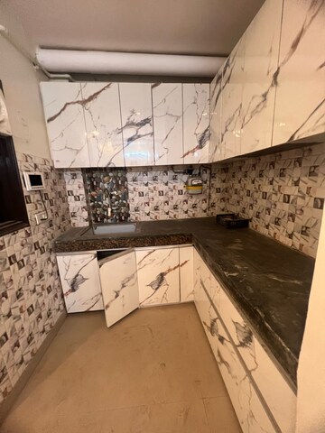 Kitchen in 2 BHK Builder Floor at Freedom Fighters Enclave – for Rent