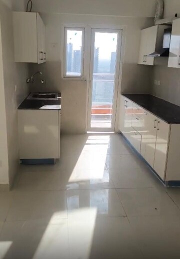Kitchen in 2 BHK Apartment at Samridhi Luxuriya Avenue, Sector 150 – for Rent
