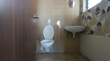 Bathroom in 1 BHK Apartment at Raunak Unnathi Woods Phase 7 A And B, Ghodbunder Road – for Sale