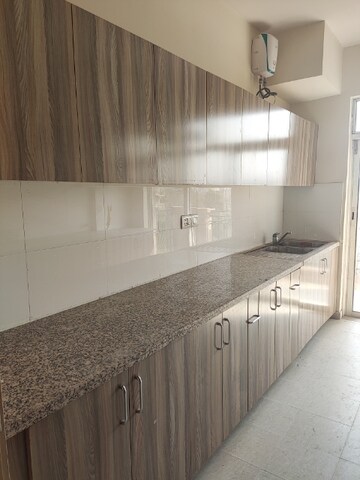 Kitchen in 4 BHK Apartment at DLF Express Greens, Manesar Sector 1a – for Rent
