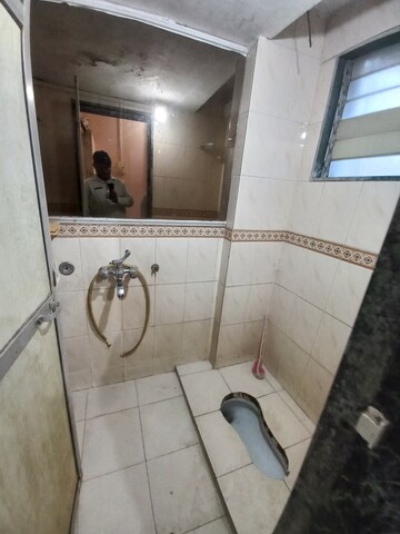 Bathroom in 1 RK Apartment at Gokuldham Complex, Goregaon East – for Rent