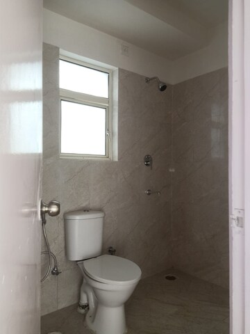Bathroom in 3 BHK Apartment at Puri Aman Vilas, Sector 89 – for Rent