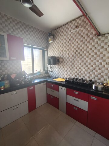 Kitchen in 1 BHK Apartment at New Dev Ashish CHS, Dhokali – for Rent