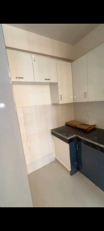 Kitchen in 2 BHK Apartment at Eureka Diya Green City, Raj Nagar Extension – for Rent