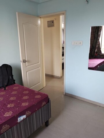 Bedroom in 2 BHK Apartment at Gulmohar Helios, Kharadi – for Rent