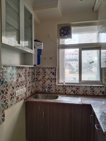 Kitchen in 2.5 BHK Apartment at Amrapali Leisure Park, Amrapali Leisure Valley – for Rent