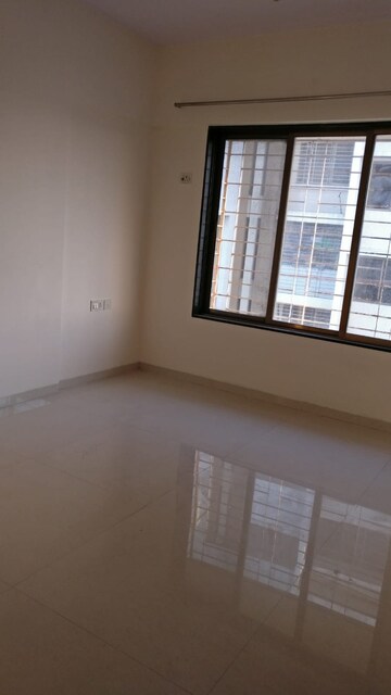 Room in 2 BHK Apartment at Karwa Om Hemgiri, Borivali East – for Rent