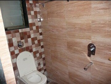 Bathroom in 2 BHK Apartment at Karwa Om Hemgiri, Borivali East – for Rent