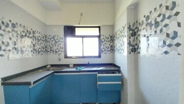 Kitchen in 1 BHK Apartment at Unnati Woods CHS, Kasarvadavali – for Sale