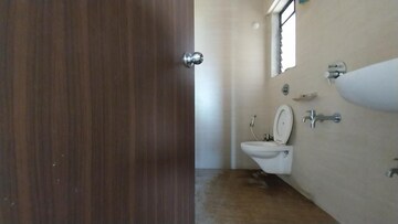 Bathroom in 1 BHK Apartment at Unnati Woods CHS, Kasarvadavali – for Sale