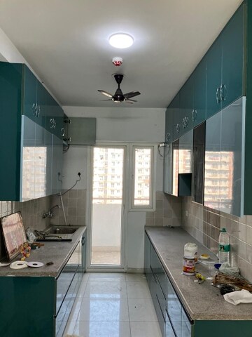 Kitchen in 3 BHK Apartment at Nirala Estate II, Tech Zone 4 Greater Noida – for Rent