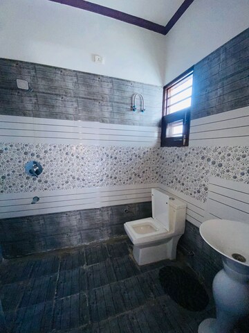 Bathroom in 2 BHK Apartment at Sunny Enclave – for Rent