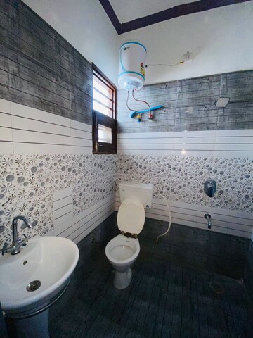 Bathroom in 2 BHK Apartment at Sunny Enclave – for Rent