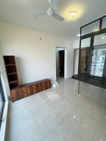 Living Room in 1 BHK Apartment at Lodha Crown Quality Homes, Majiwada – for Rent