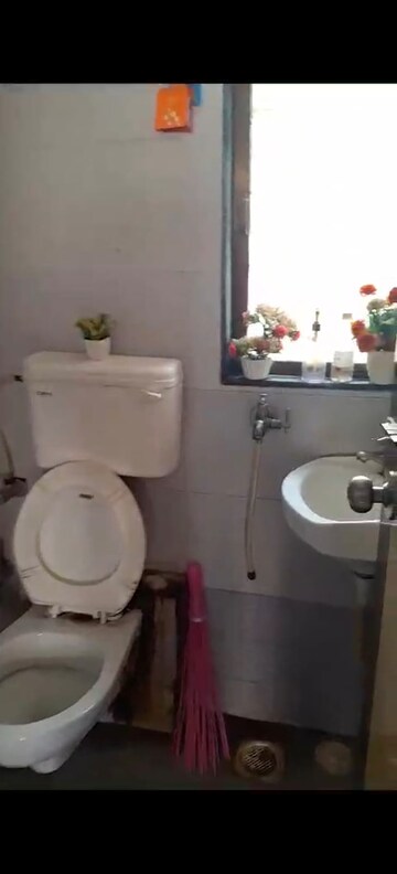 Bathroom in 2 BHK Apartment at RNA NG Paradise, Mira Road – for Rent
