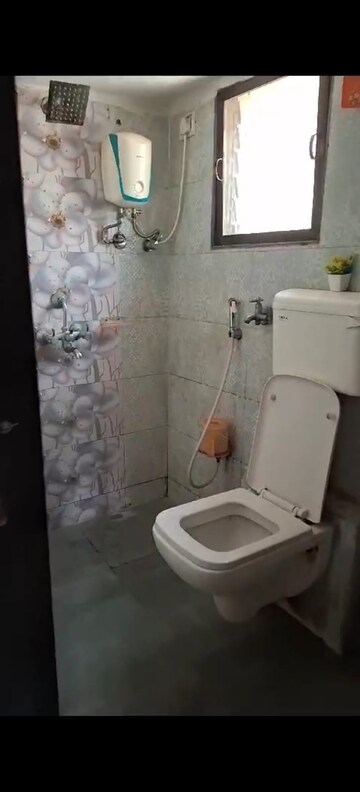 Bathroom in 2 BHK Apartment at RNA NG Paradise, Mira Road – for Rent
