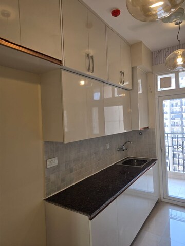 Kitchen in 3 BHK Apartment at ATS Nobility, Sector 4, Greater Noida – for Rent