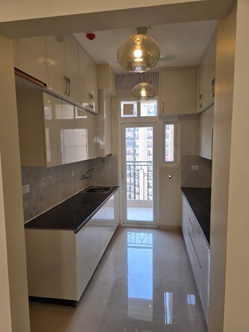 Kitchen in 3 BHK Apartment at ATS Nobility, Sector 4, Greater Noida – for Rent
