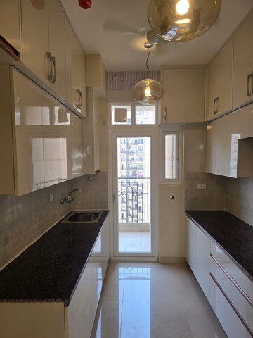Kitchen in 3 BHK Apartment at ATS Nobility, Sector 4, Greater Noida – for Rent